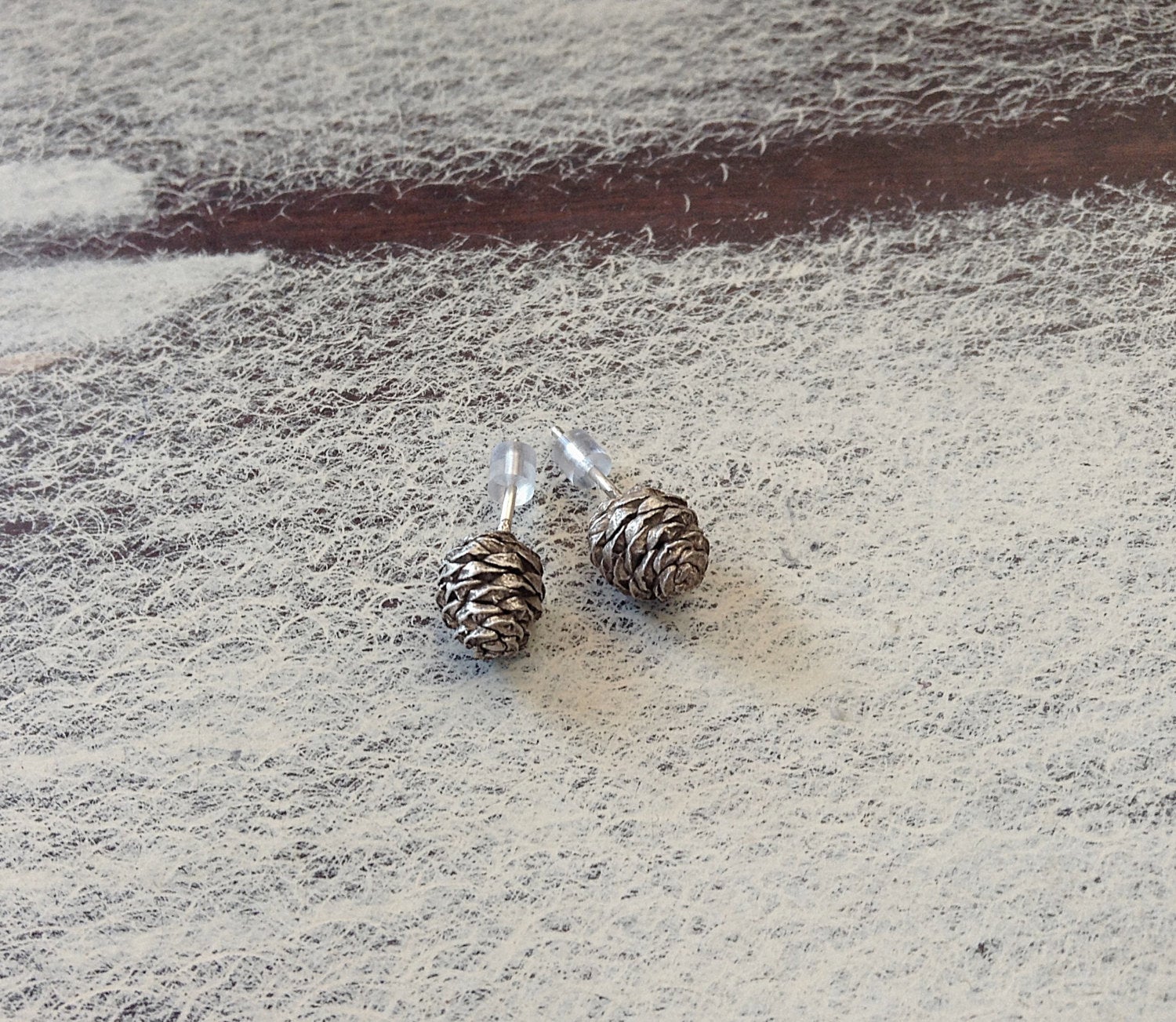 Silver pine store cone earrings