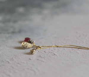 9k solid gold seed necklace with ruby , Gold charm necklace