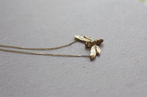 14k solid gold moth deaths head necklace with ruby gemstone