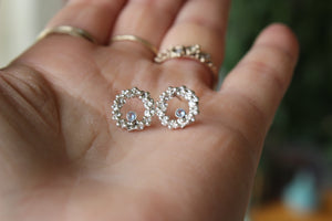Tiny open circle stud earrings with aquamarine